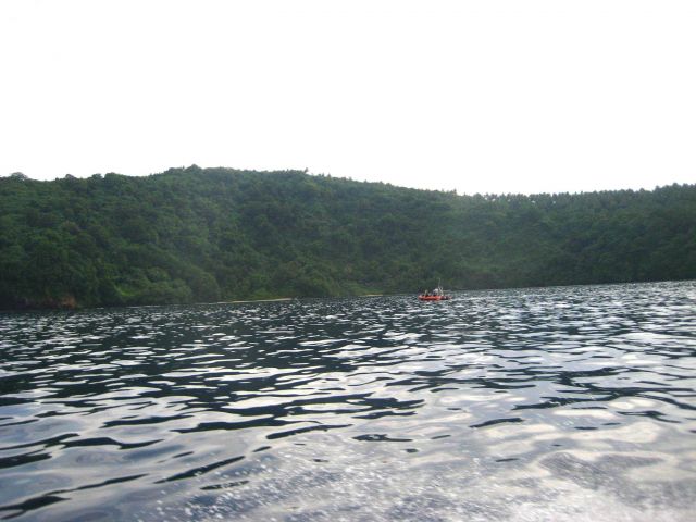 Scientists conducting studies from a RHIB in the vicinity of Fagatele Bay. Picture