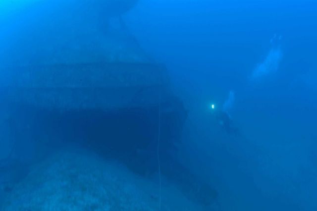 Divers on the shipwreck of the NORTHERN LIGHT at 190 feet. Picture