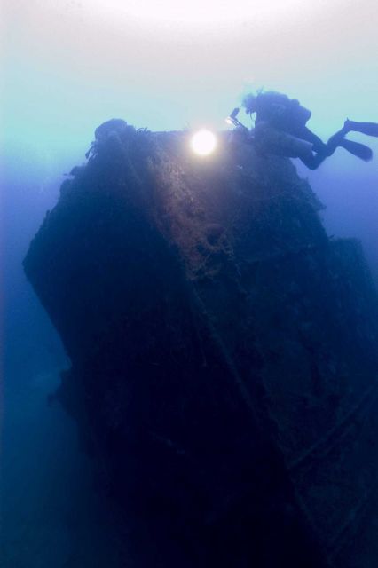 Diver on the bow of the NORTHERN LIGHT at nearly 190 feet water depth. Picture