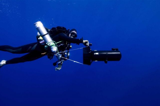 Diving archaeologist descending to the remains of the NORTHERN LIGHT. Picture