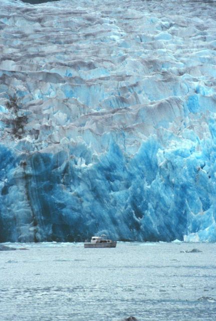 RA-3 boat is dwarfed by Sawyer Glacier at the head of Tracy Arm Picture