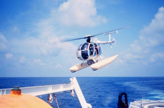 MD500 taking off from NOAA Ship DAVID STARR JORDAN for marine mammal studies. Picture
