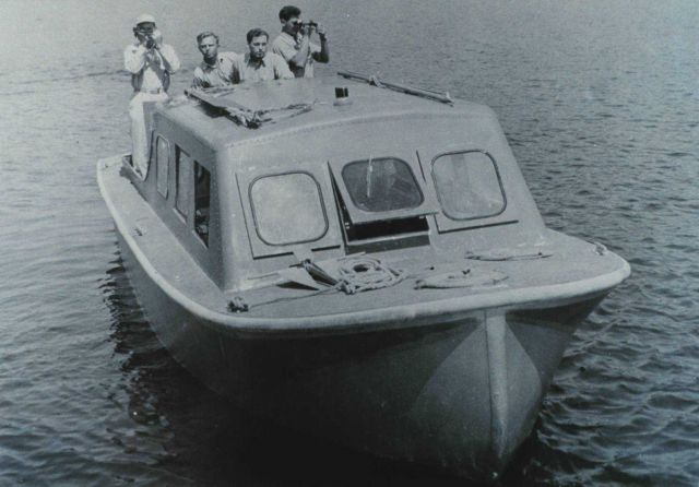 Conducting hydrographic survey work off Launch 168, a SURVEYOR launch Picture