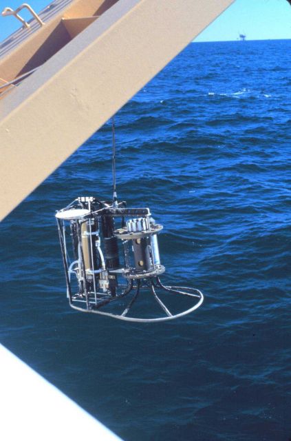 Deployment of CTD and water sampling bottles Picture