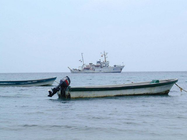 NOAA Ship McARTHUR offshore from native-owned pangas at Isla Gorgona during STAR 2000 project. Picture