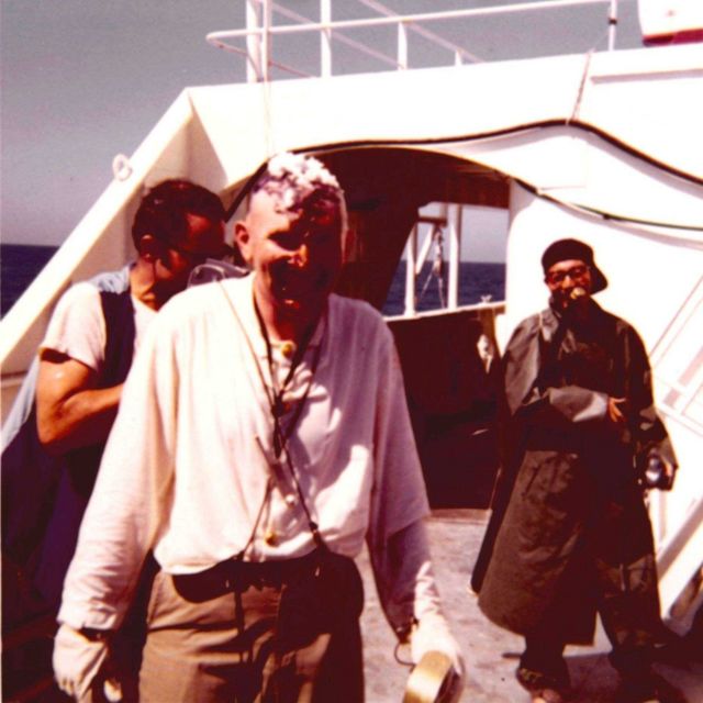 Commander Hubert Keith, Executive Officer of the ESSA Ship DISCOVERER, after a trip to the royal barber during Equator crossing ceremonies. Picture