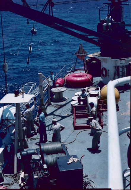 Deploying a tower from the ESSA Ship DISCOVERER for mounting solar radiance instruments and other meteorological instruments. Picture