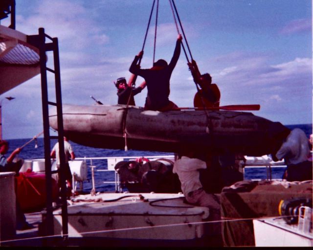 Launching a zodiac to assist in erecting buoy-mounted solar radiance tower in the equatorial Atlantic. Picture