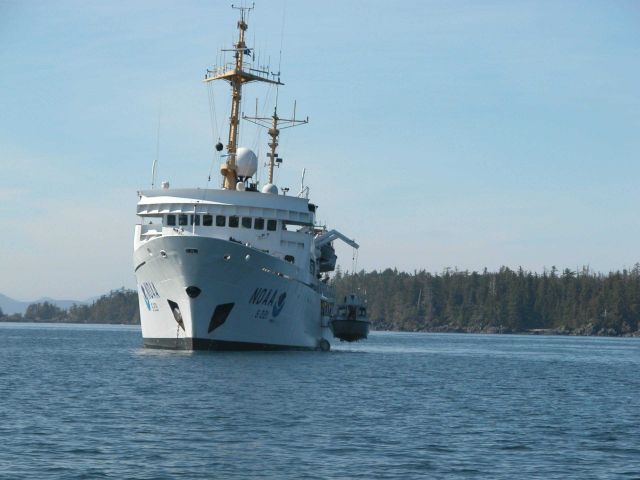 NOAA Ship RAINIER picking up survey launch. Picture