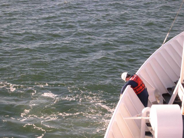 Dropping the hook and watching the anchor chain pay out on the NOAA Ship THOMAS JEFFERSON. Picture