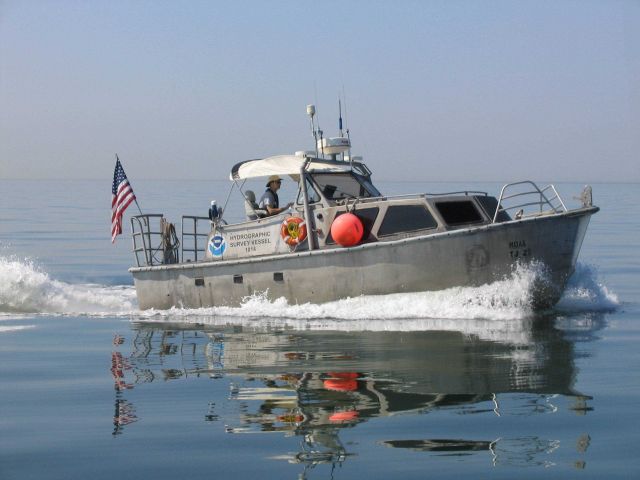 Glassy smooth days make launch work look easy. Picture