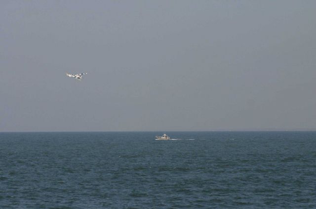 Rare photo of NOAA survey launch and NOAA helicopter Picture
