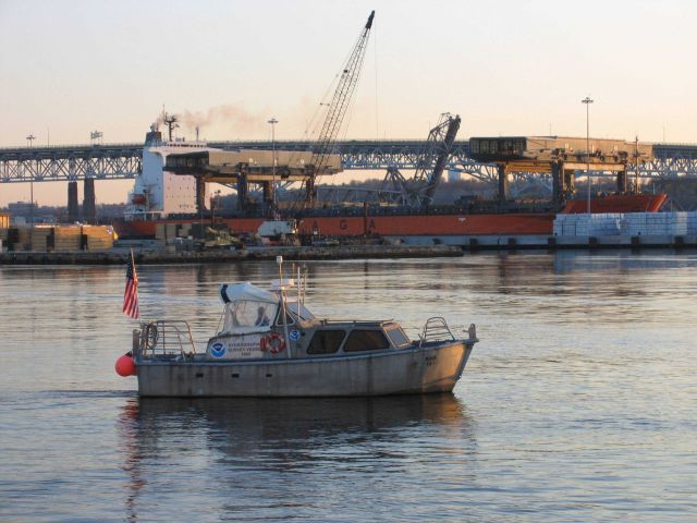 Survey launch leaving the ship early in the morning. Picture