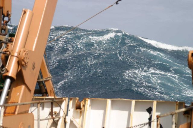 A large wave towering astern of the NOAA Ship DELAWARE II. Picture