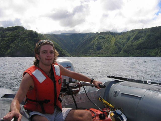 Coxswain Huntley operating a small inflatable boat off the NOAA Ship OSCAR DYSON . Picture