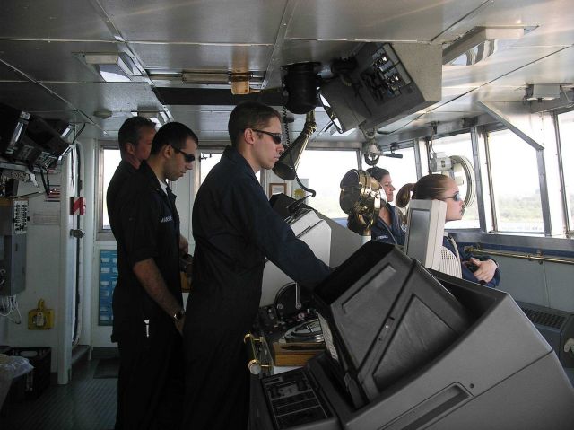 Officers on the Miller Freeman piloting the ship leaving port during the 2005 NWFSC Acoustic Hake Survey. Picture