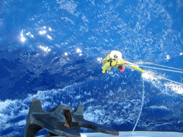 Touching up the bow of the NOAA Ship HI'IALAKAI Picture