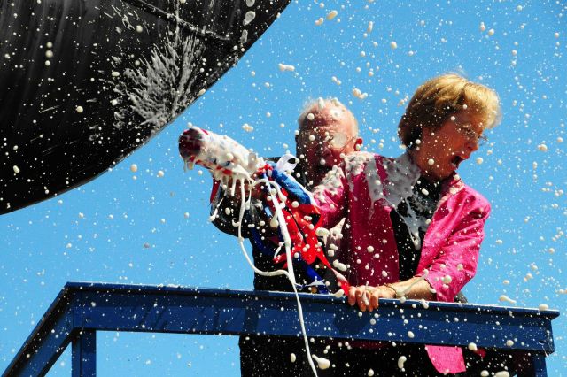 Susan Lautenbacher, wife of NOAA Administrator Conrad Lautenbacher, breaks bottle of champagne on bow of BELL M Picture