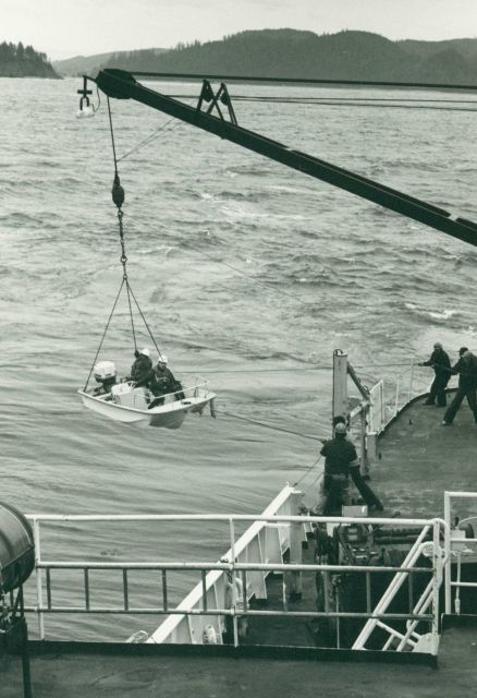 Deploying a Boston Whaler from the starboard quarter of the NOAA Ship OCEANOGRAPHER somewhere in the Inside Passage. Picture