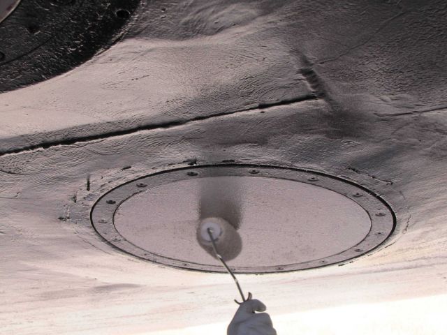 Transducer on the hull of the NOAA Ship PISCES being painted Picture