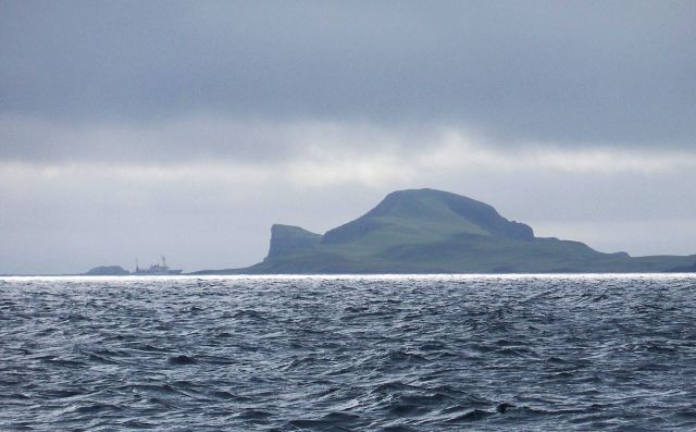 NOAA Ship RAINIER seen in the distance in the Pavlof Islands. Picture