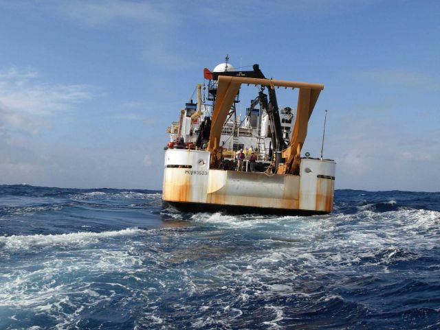 NOAA Ship KA'IMIMOANA (R333) seen from ship's boat during buoy operations. Picture