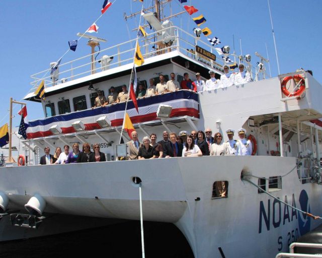 Dignitaries and guests line the railing of the NOAA Ship FERDINAND R Picture