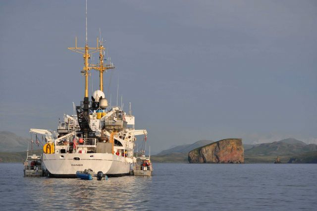 Stern view of NOAA Ship RAINIER with survey launches alongside Picture