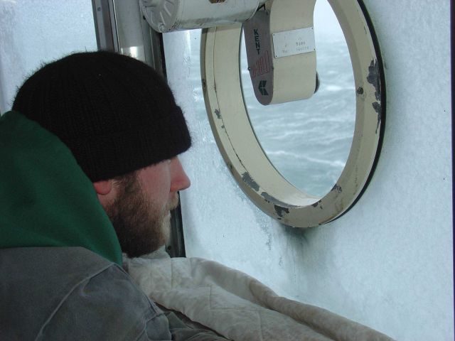Maintaining a sharp lookout in cold rought weather with heavey icing on the NOAA Ship MILLER FREEMAN. Picture
