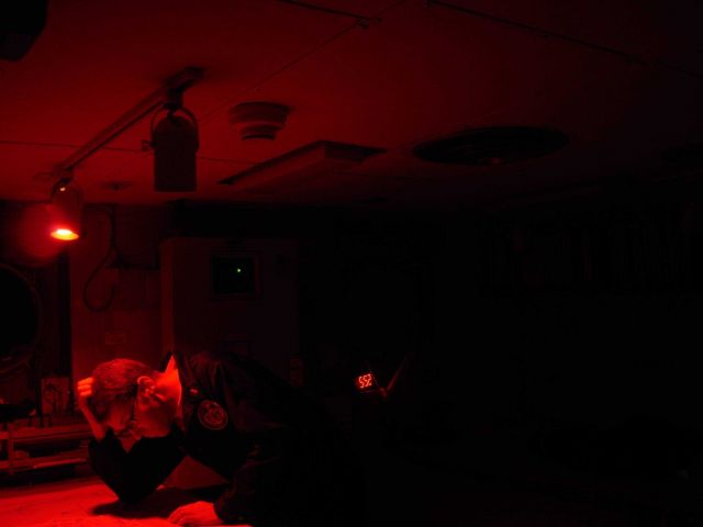 Pondering position and location of next station in chart room of NOAA ship MILLER FREEMAN Picture