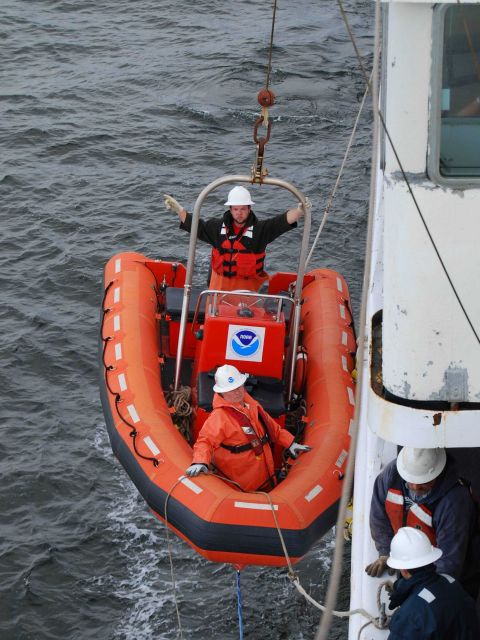 Deploying MILLER FREEMAN rigid hull inflatable boat. Picture