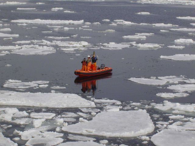 NOAA Ship MILLER FREEMAN rigid hull inflatable boat in the ice of the Bering Sea. Picture