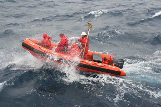 NOAA Ship MILLER FREEMAN rigid hull inflatable boat operating in choppy seas. Picture