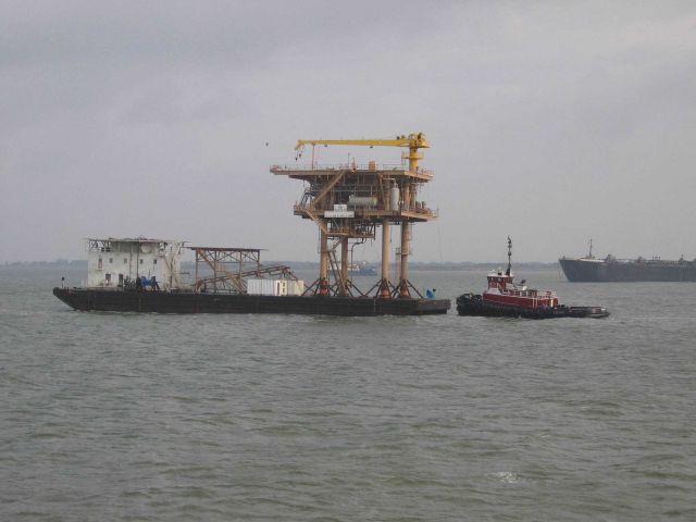 Transporting an oil platform in Galveston Bay. Picture
