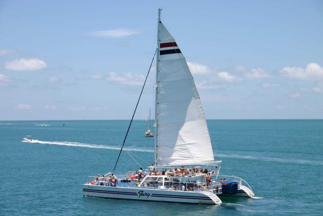 Sailing catamaran PACIFIC FURY provides ocean experience for tourists at Key West. Picture