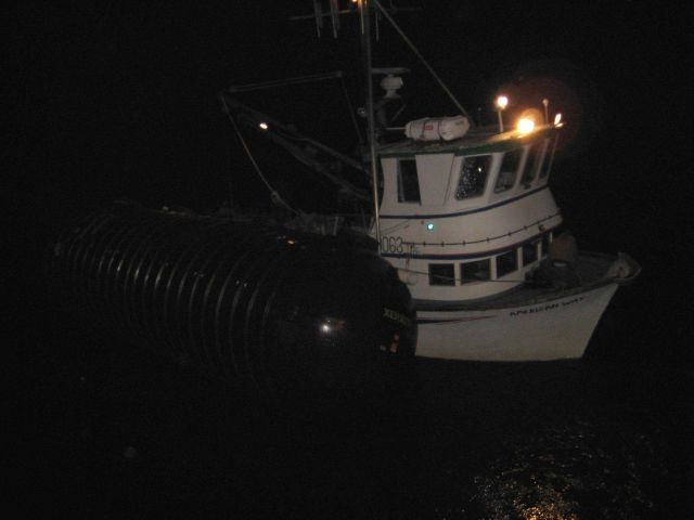 Fishing vessel tied up outboard of SS Coastal Nomad during ferocious winter storm Picture