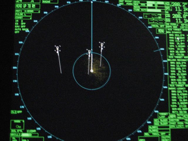 Radar scope view of ships passing at sea in the Gulf of Alaska. Picture