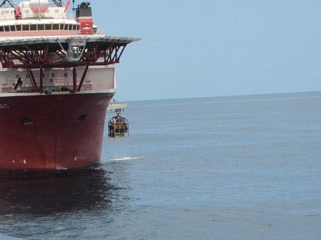 The oil field work vessel BOA SUB C recovering a robotic vehicle used in Deepwater Horizon disaster well containment efforts. Picture