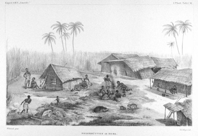 African native huts in a clearing at Boma along the Congo River. Picture