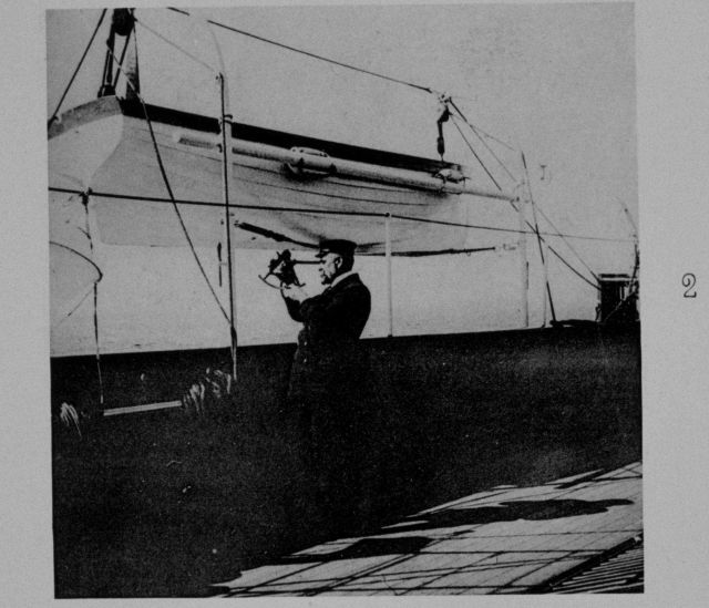 Commander Carr measuring the altitude of the sun Picture