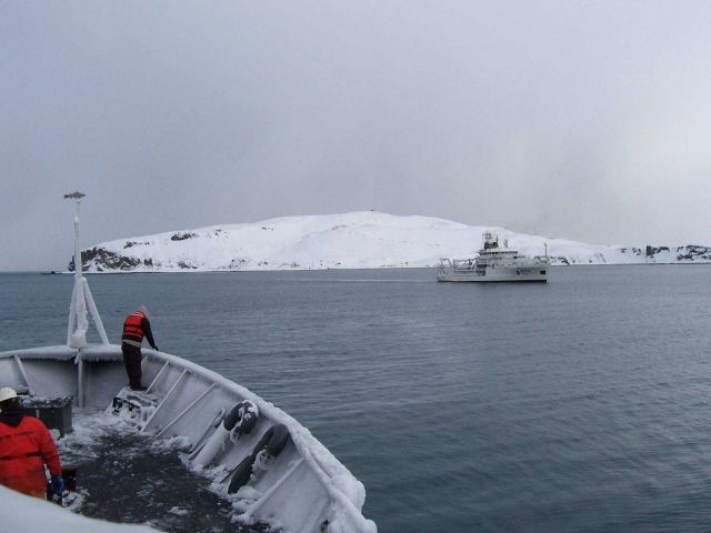 NOAA Ship OSCAR DYSON passing the bow of NOAA Ship MILLER FREEMAN in Kodiak Harbor. Picture