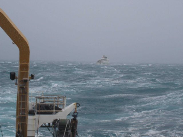 NOAA Ship OSCAR DYSON in a storm as seen astern from the NOAA Ship MILLER FREEMAN. Picture