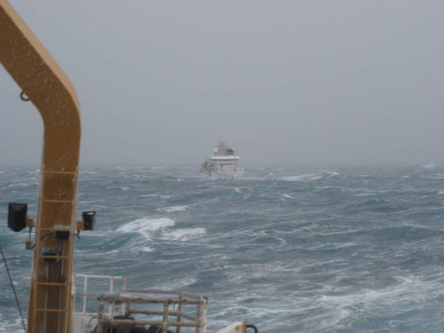 NOAA Ship OSCAR DYSON in a storm as seen astern from the NOAA Ship MILLER FREEMAN. Picture