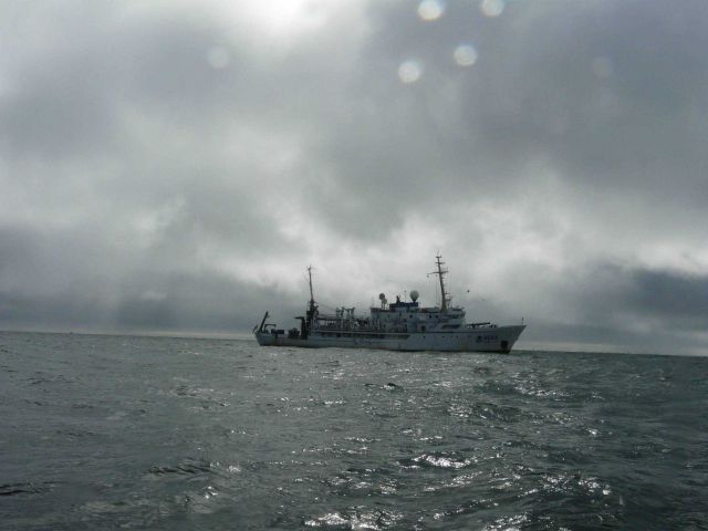 NOAA Ship FAIRWEATHER at the end of the rainbow off Cape Blossom. Picture