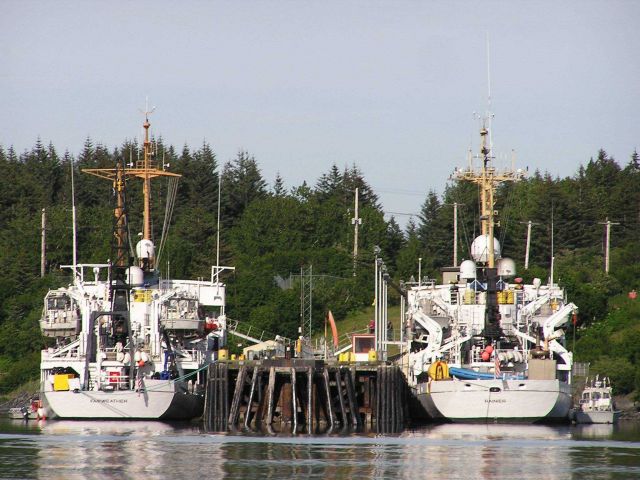 Stern view of NOAA Ships FAIRWEATHER and RAINIER tied up at Kodiak pier. Picture