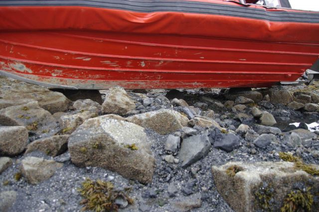 NOAA SHIP FAIRWEATHER RHIB damage after grounding at a low tide. Picture