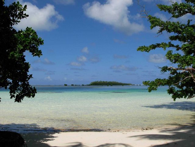 White sand beach, a tropical lagoon, and small islets - a nice place to be. Picture