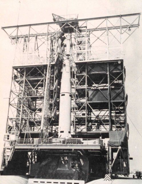 Second stage of Thor-Able rocket being set in place prior to launching TIROS I Picture