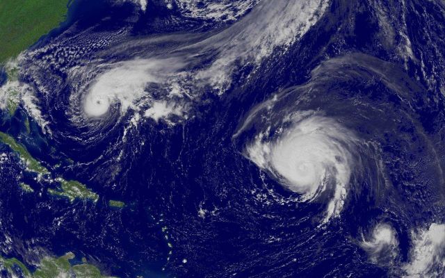 Hurricane Jeanne, Hurricane Karl, and Tropical Storm Lisa are all in view from west to east. Picture