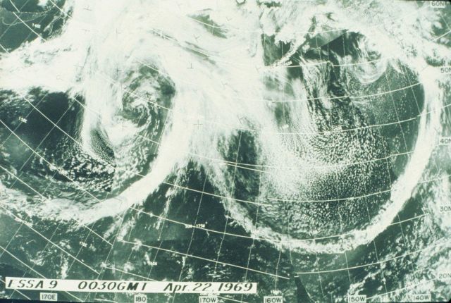 A remarkable image of two frontal systems converging south of the Aleutian Islands Picture